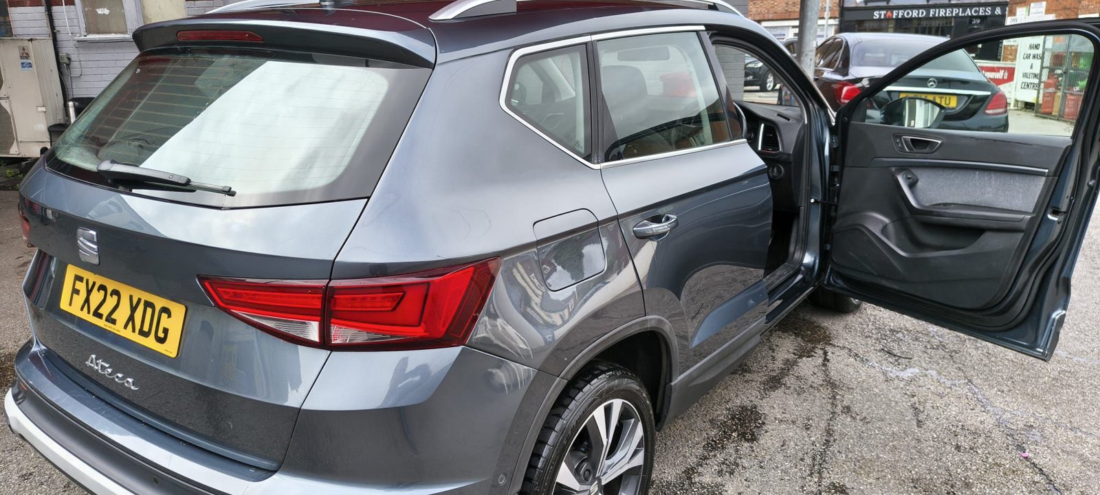Grey SEAT estate with repaired rear panel and tailgate